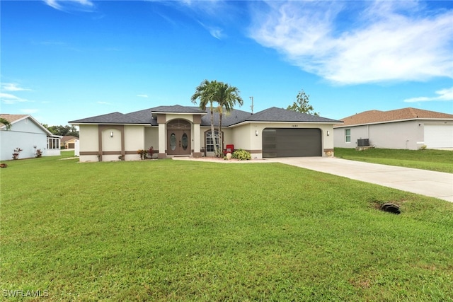 1622 SE 20th St, Cape Coral, FL 33990 - view of front of house featuring stucco siding, an attached garage, driveway, and a front yard