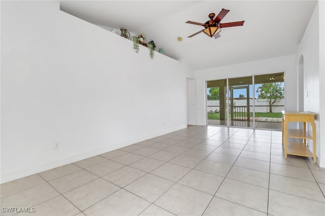 1622 SE 20th St, Cape Coral, FL 33990 - unfurnished room featuring a ceiling fan, light tile patterned floors, arched walkways, baseboards, and high vaulted ceiling