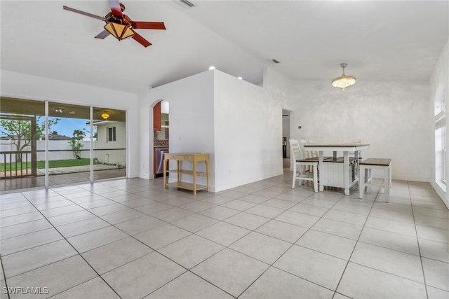 1622 SE 20th St, Cape Coral, FL 33990 - unfurnished room with high vaulted ceiling, arched walkways, ceiling fan, healthy amount of natural light, and tile patterned flooring
