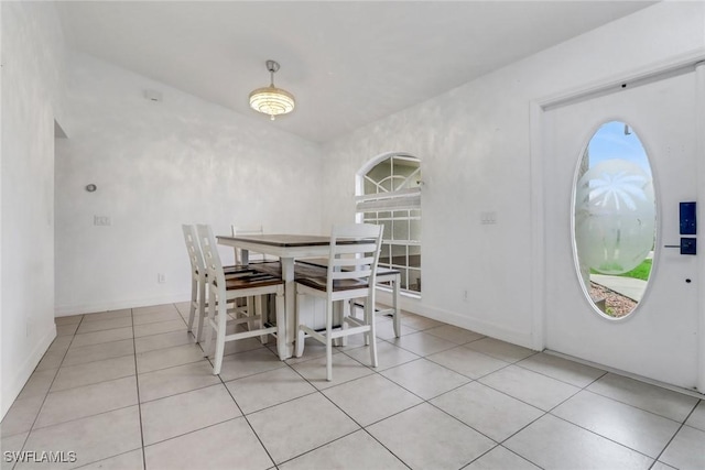 1622 SE 20th St, Cape Coral, FL 33990 - dining room featuring light tile patterned flooring and baseboards