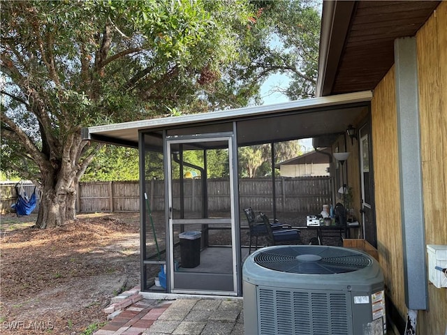 2325 55th Ter SW, Naples, FL 34116 - view of patio featuring a sunroom