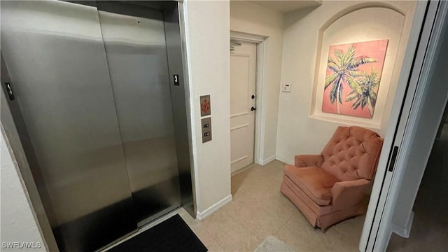 10041 Lake Cove Dr Unit 202, Fort Myers, FL 33908 - bathroom with elevator and baseboards