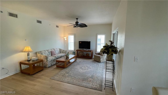 10041 Lake Cove Dr Unit 202, Fort Myers, FL 33908 - living area with ceiling fan and wood finished floors