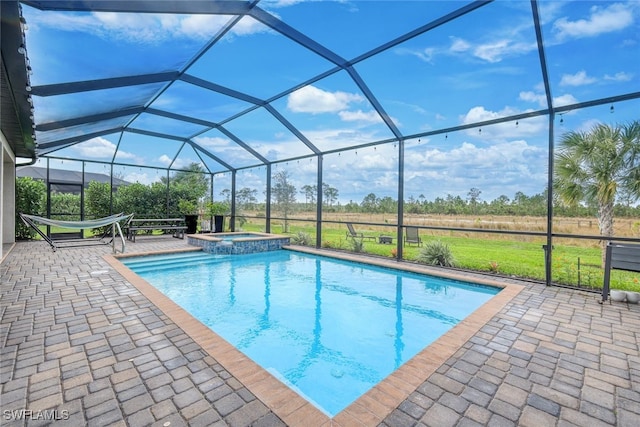 19477 The Place Blvd, Estero, FL 33928 - view of swimming pool with a patio area, a lanai, and a pool with connected hot tub