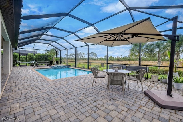 19477 The Place Blvd, Estero, FL 33928 - view of pool with a patio, a pool with connected hot tub, glass enclosure, and outdoor dining area