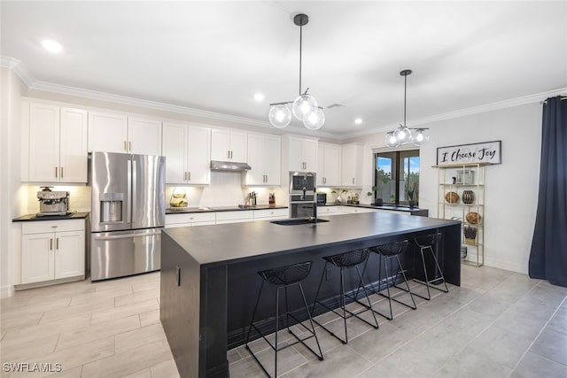 19477 The Place Blvd, Estero, FL 33928 - kitchen with appliances with stainless steel finishes, dark countertops, under cabinet range hood, decorative backsplash, and crown molding