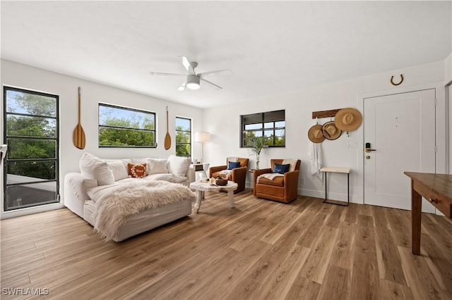 4805 Gary Rd, Bonita Springs, FL 34134 - living room featuring light wood-type flooring and ceiling fan