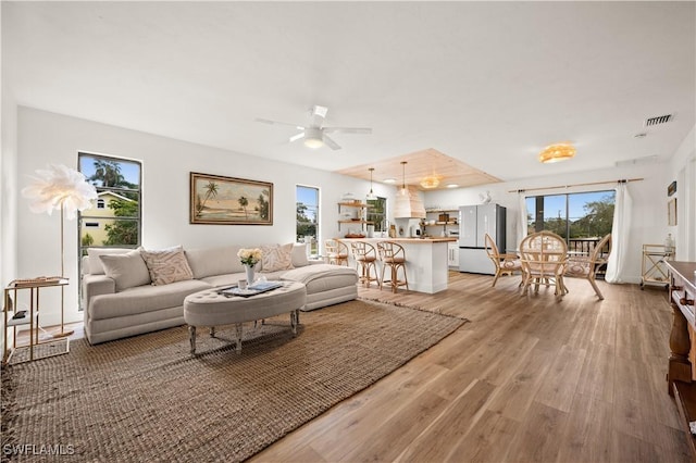 4805 Gary Rd, Bonita Springs, FL 34134 - living area featuring light wood-style floors and ceiling fan