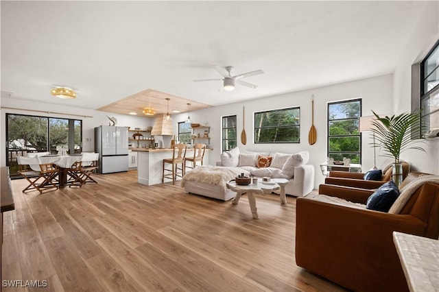 4805 Gary Rd, Bonita Springs, FL 34134 - living room featuring light wood-style floors and ceiling fan