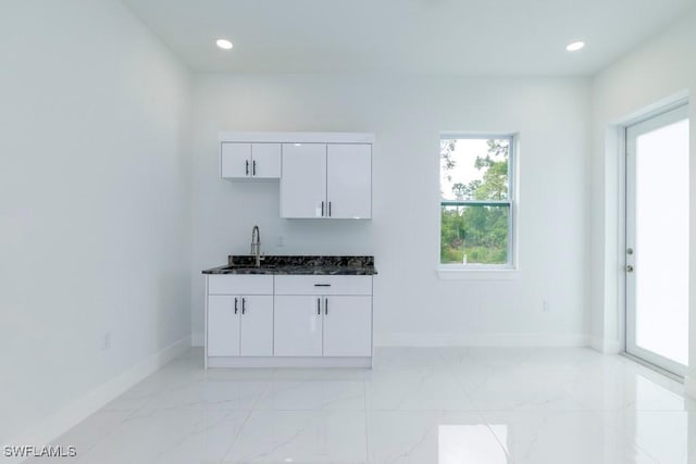 2501 26th St W, Lehigh Acres, FL 33971 - indoor bar with light marble finish flooring and recessed lighting