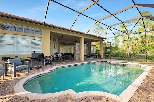 1640 Golden Gate Blvd W, Naples, FL 34117 - view of swimming pool featuring a patio area, glass enclosure, and a pool with connected hot tub