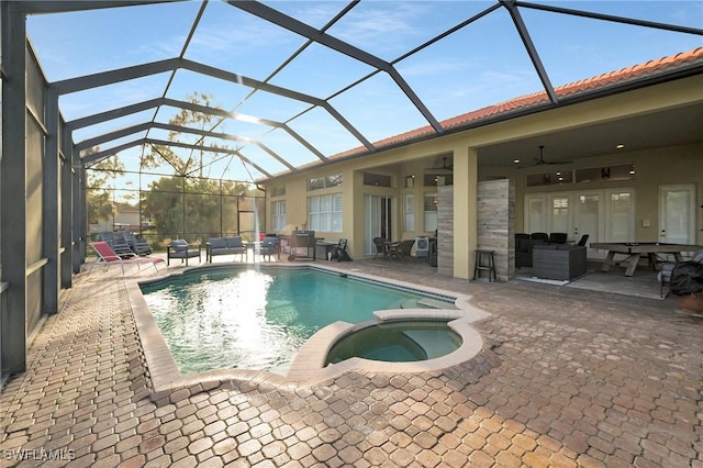 1640 Golden Gate Blvd W, Naples, FL 34117 - view of pool with a patio, a pool with connected hot tub, outdoor lounge area, a ceiling fan, and glass enclosure