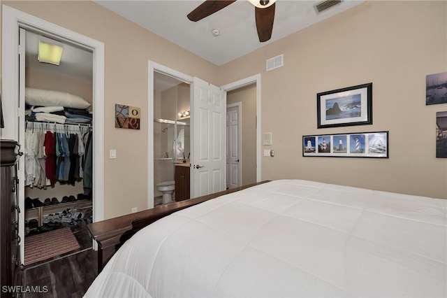 1640 Golden Gate Blvd W, Naples, FL 34117 - bedroom with a closet, ensuite bathroom, wood finished floors, and ceiling fan