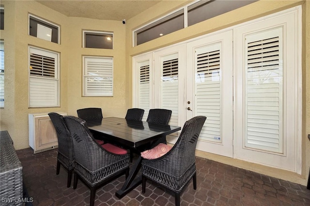 1640 Golden Gate Blvd W, Naples, FL 34117 - dining room featuring brick patterned floors