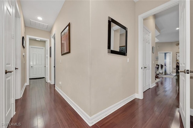1640 Golden Gate Blvd W, Naples, FL 34117 - hallway with dark wood finished floors