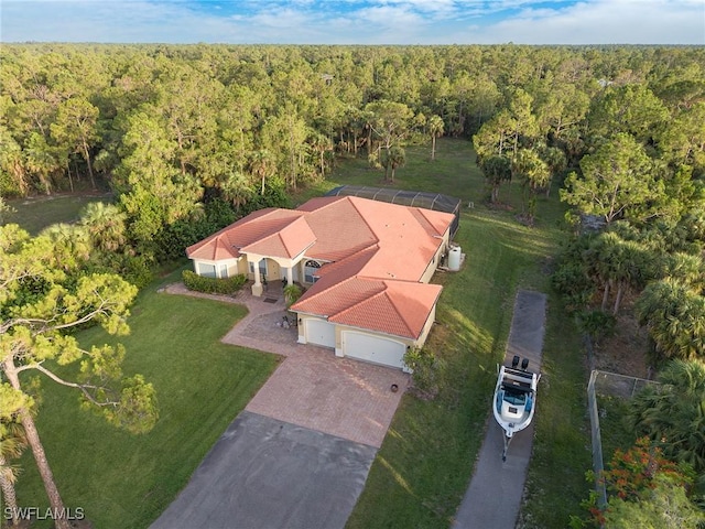 1640 Golden Gate Blvd W, Naples, FL 34117 - aerial view of property and surrounding area featuring a forest