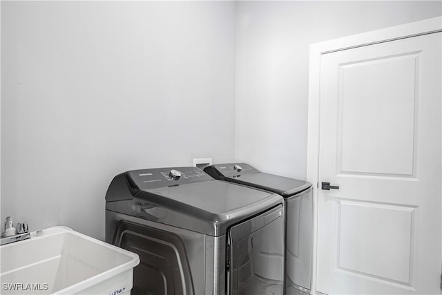 3121 71st St W, Lehigh Acres, FL 33971 - laundry room with washer and dryer