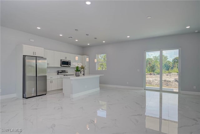 3417 71st St W, Lehigh Acres, FL 33971 - kitchen with appliances with stainless steel finishes, baseboards, recessed lighting, light marble finish floors, and white cabinets
