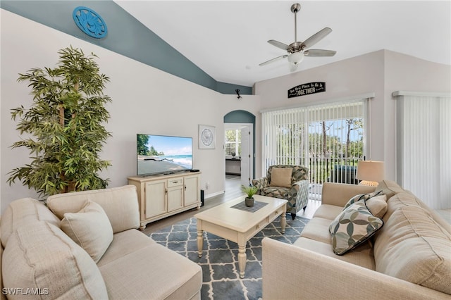 28220 Caballero Way Unit 2422, Bonita Springs, FL 34135 - living area featuring arched walkways, ceiling fan, dark wood-style floors, and high vaulted ceiling