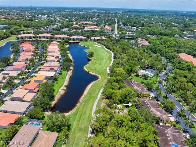 28220 Caballero Way Unit 2422, Bonita Springs, FL 34135 - aerial view of property and surrounding area with nearby suburban area, a large body of water, a golf course, and a tree filled landscape