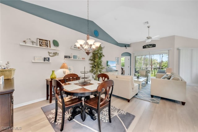 28220 Caballero Way Unit 2422, Bonita Springs, FL 34135 - dining area with a chandelier, light wood-style floors, a ceiling fan, baseboards, and high vaulted ceiling