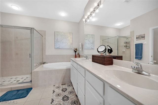 28220 Caballero Way Unit 2422, Bonita Springs, FL 34135 - full bathroom featuring tile patterned flooring, a garden tub, double vanity, and a stall shower