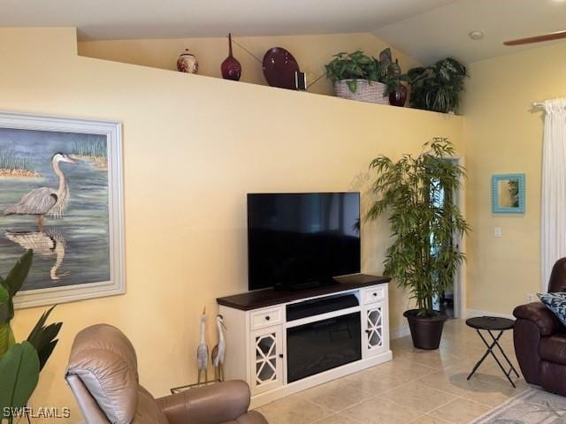 1505 NW 33rd Pl, Cape Coral, FL 33993 - living area featuring lofted ceiling, tile patterned floors, and a ceiling fan