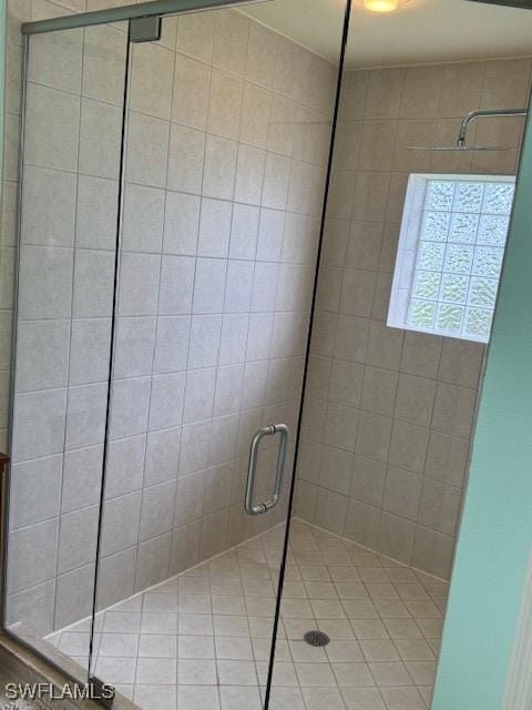 1505 NW 33rd Pl, Cape Coral, FL 33993 - bathroom with a shower stall and tile patterned floors