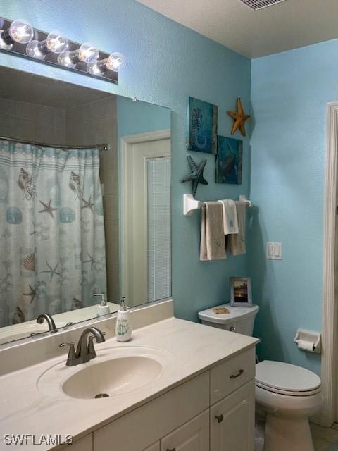 1505 NW 33rd Pl, Cape Coral, FL 33993 - bathroom featuring vanity and curtained shower