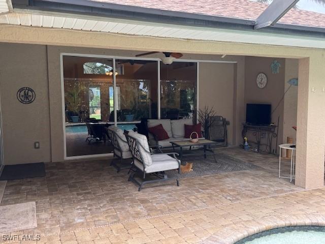 1505 NW 33rd Pl, Cape Coral, FL 33993 - view of patio / terrace with an outdoor pool