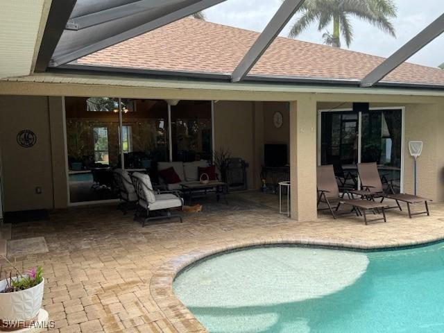 1505 NW 33rd Pl, Cape Coral, FL 33993 - swimming pool featuring a patio area and a lanai