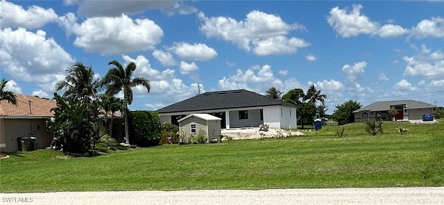 1505 NW 33rd Pl, Cape Coral, FL 33993 - back of property with a yard