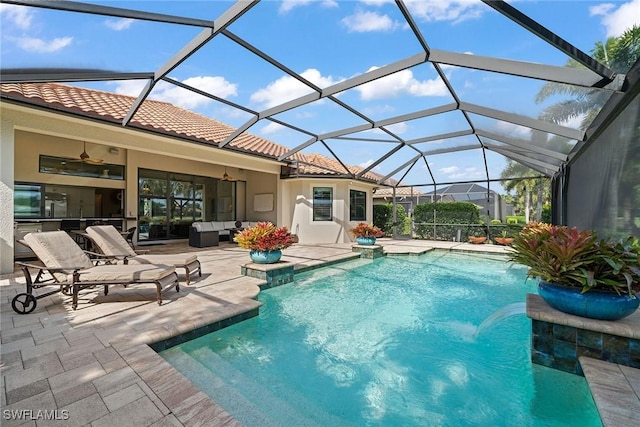 11950 Heather Woods Ct, Naples, FL 34120 - swimming pool featuring an outdoor hangout area, a patio, and ceiling fan