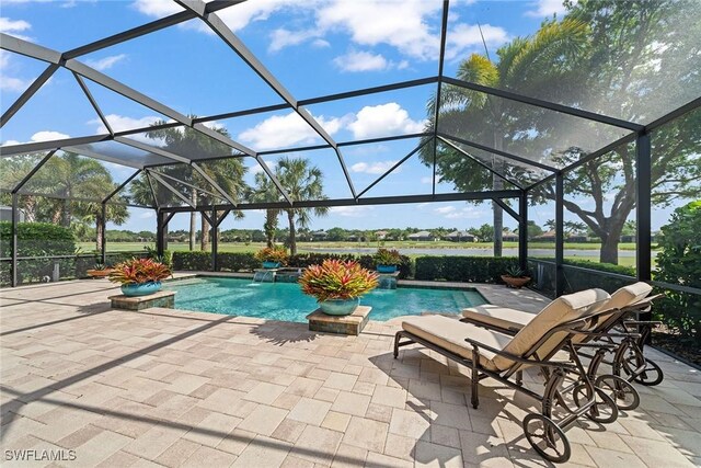 11950 Heather Woods Ct, Naples, FL 34120 - swimming pool with a patio and glass enclosure