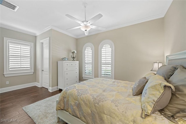11950 Heather Woods Ct, Naples, FL 34120 - bedroom with wood finished floors, baseboards, crown molding, and a ceiling fan
