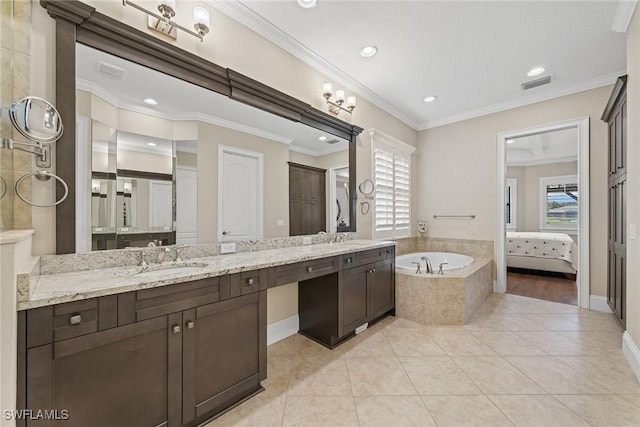11950 Heather Woods Ct, Naples, FL 34120 - ensuite bathroom featuring a bath, double vanity, tile patterned flooring, recessed lighting, and crown molding