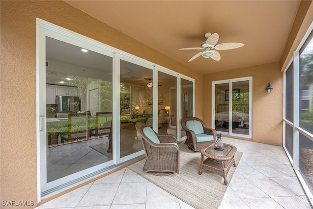 6637 Alden Woods Cir Unit 102, Naples, FL 34113 - sunroom with a ceiling fan