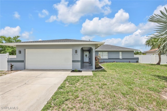 628 SW 9th Ave, Cape Coral, FL 33991 - ranch-style house featuring stucco siding, driveway, and an attached garage