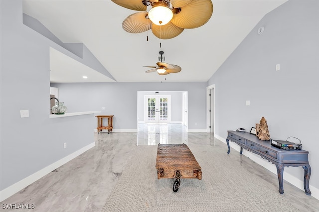 628 SW 9th Ave, Cape Coral, FL 33991 - living room with lofted ceiling, a ceiling fan, french doors, and baseboards