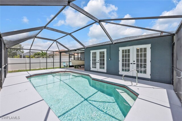 628 SW 9th Ave, Cape Coral, FL 33991 - view of swimming pool featuring french doors and a patio area