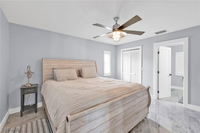 628 SW 9th Ave, Cape Coral, FL 33991 - bedroom featuring baseboards, a closet, and ceiling fan