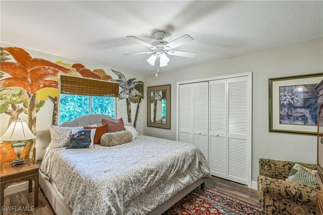 1440 14th Ave NE, Naples, FL 34120 - bedroom with a closet, wood finished floors, and ceiling fan
