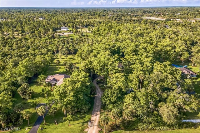 1440 14th Ave NE, Naples, FL 34120 - drone / aerial view of a heavily wooded area