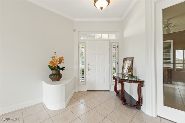 3051 Lancaster Dr Unit 4, Naples, FL 34105 - entrance foyer with light tile patterned floors, ornamental molding, baseboards, and ceiling fan