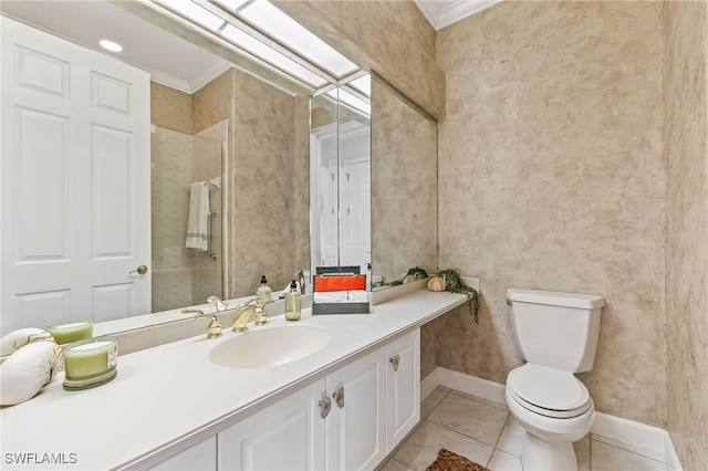 3051 Lancaster Dr Unit 4, Naples, FL 34105 - bathroom with ornamental molding, tile patterned floors, vanity, toilet, and baseboards