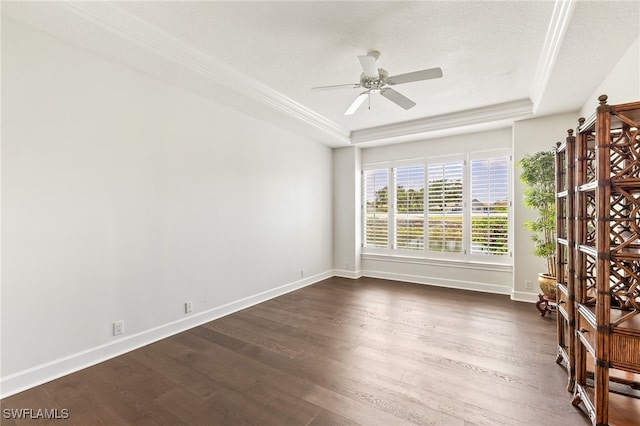 3051 Lancaster Dr Unit 4, Naples, FL 34105 - spare room featuring a raised ceiling, dark wood finished floors, ceiling fan, baseboards, and crown molding