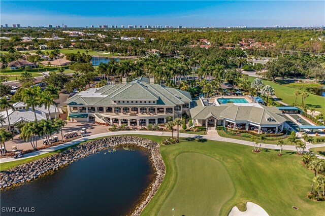 3051 Lancaster Dr Unit 4, Naples, FL 34105 - aerial view of property and surrounding area featuring a large body of water, a golf course, and city skyline