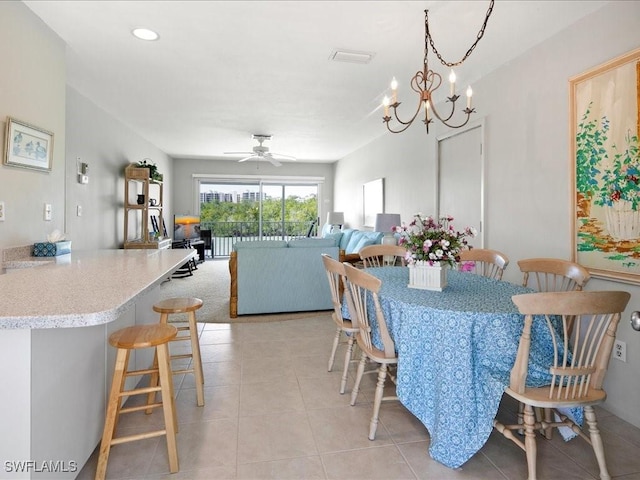 1170 Edington Pl Unit A8, Marco Island, FL 34145 - dining space featuring light tile patterned flooring, a chandelier, ceiling fan, and recessed lighting