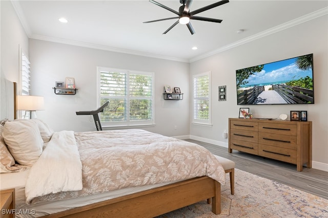 bedroom featuring crown molding, light wood-style floors, recessed lighting, and a ceiling fan