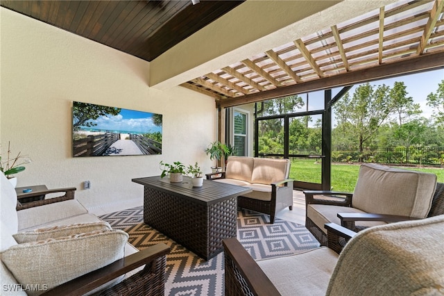 view of patio featuring an outdoor hangout area and a pergola